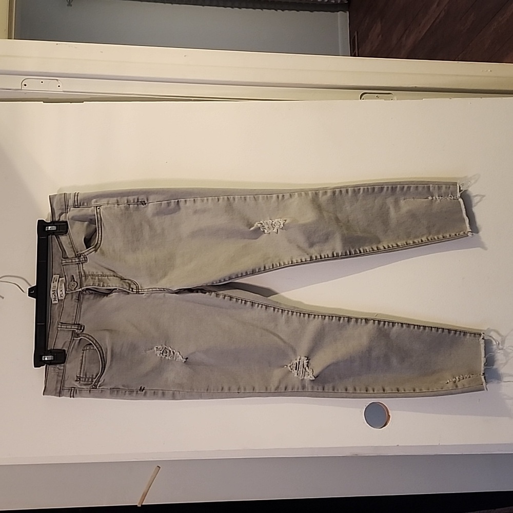 Distressed grey denim jeans. Mid rise ankle length. Siz 13 but fits like a 10